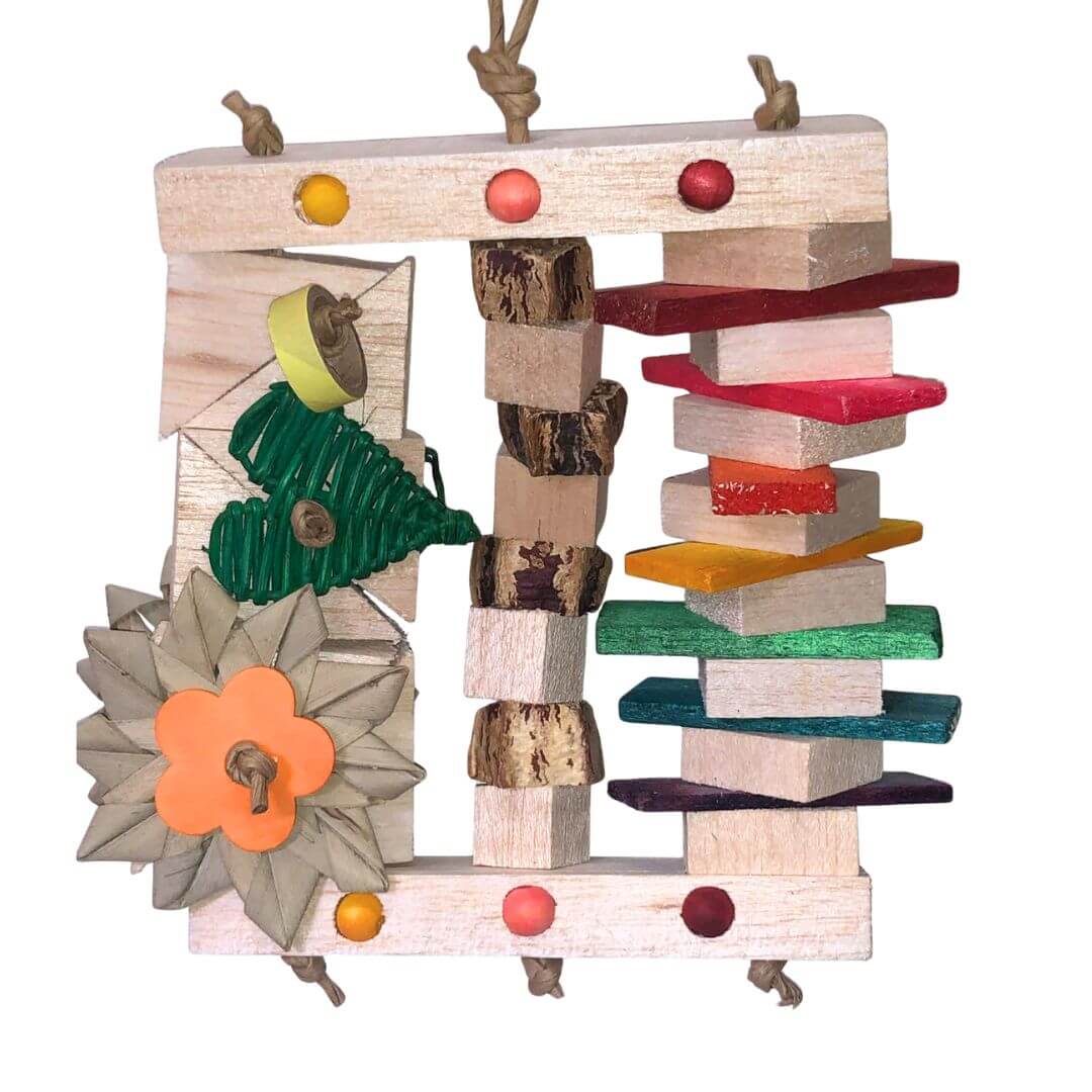 Balsa bird toy with colorful shelves and a flower decoration on a white background