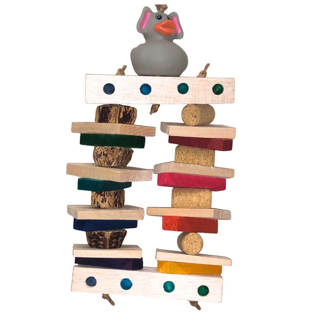 balsa bird toy with a colorful duck figure on top against a white background