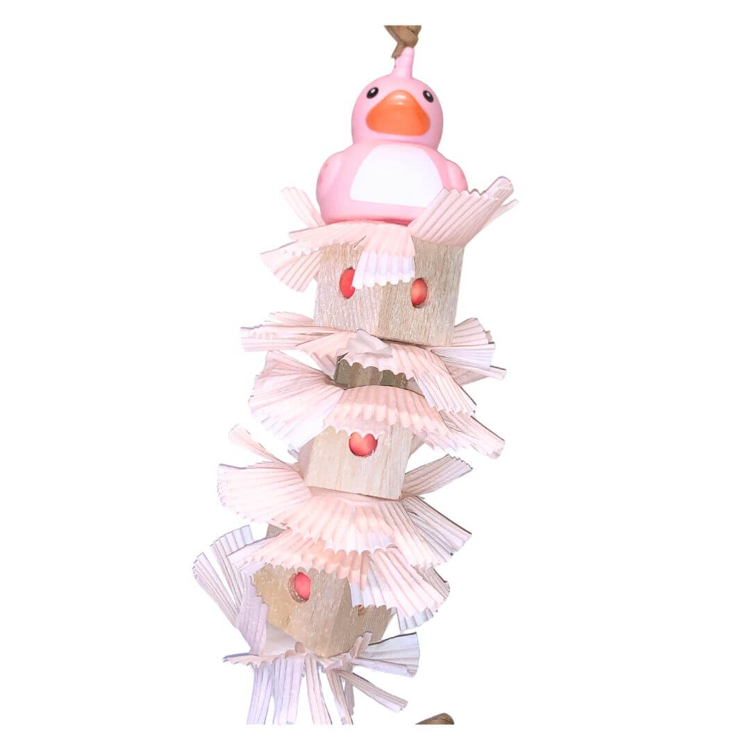 balsa bird toy in pink