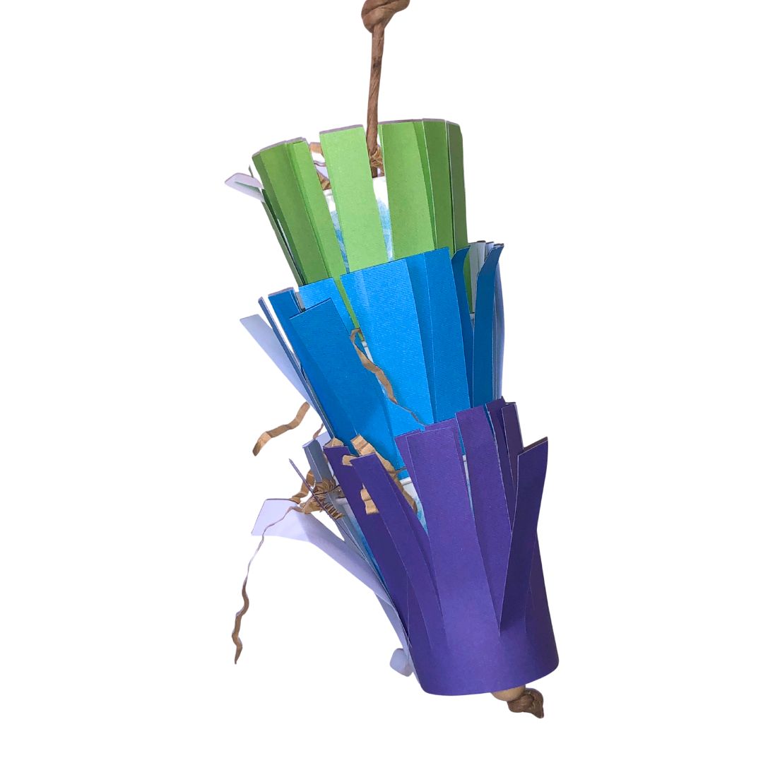 bird toy with Colorful paper craft hanging on a white background
