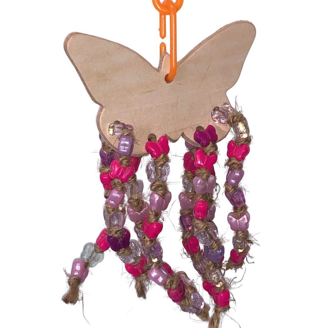 Butterfly-shaped wooden ornament with beaded strings on a white background