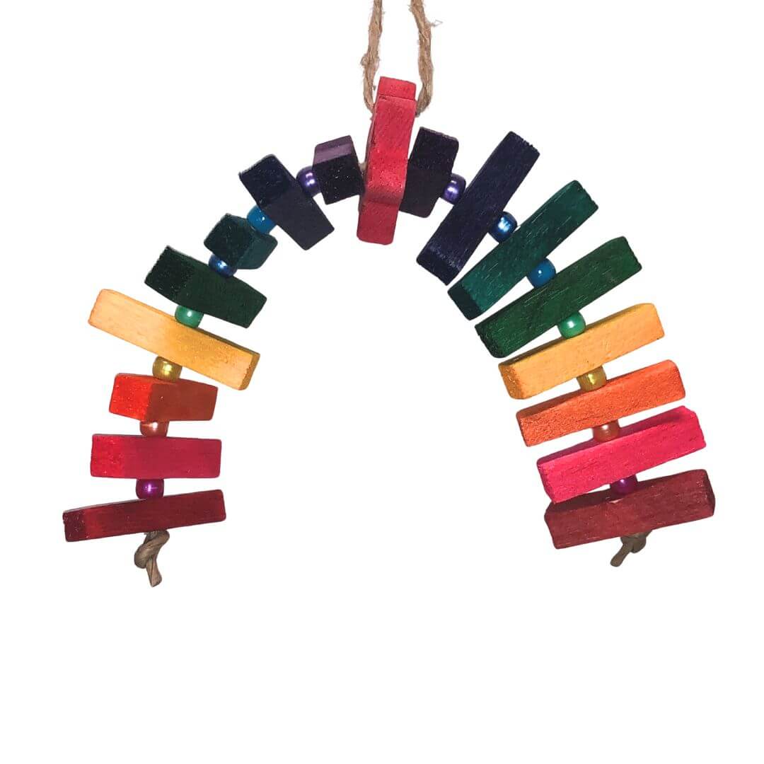 colorful small block balsa toy with pinewood star in the centre.