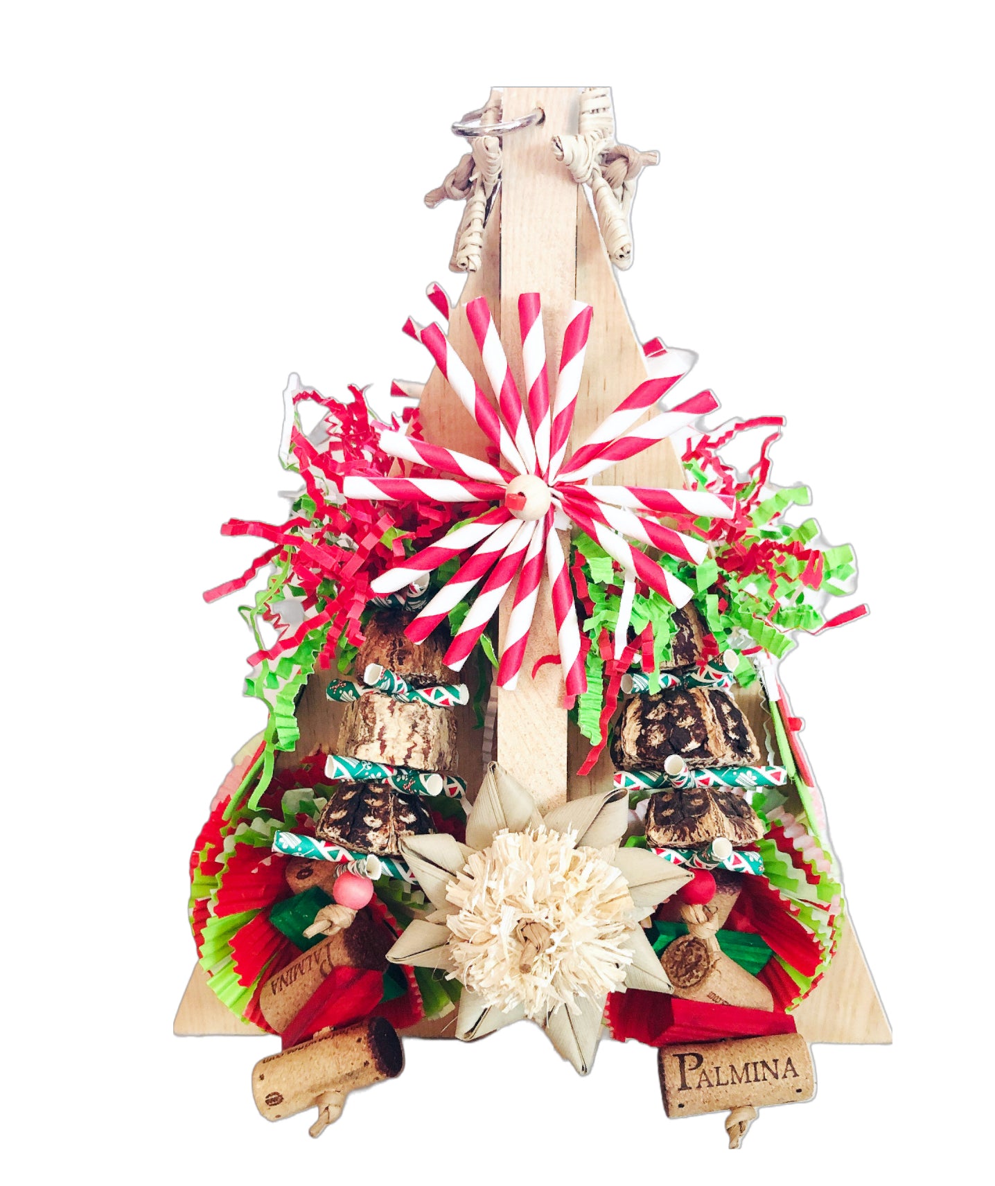 Bird toy in shape of a tree with lots of different textures and materials 