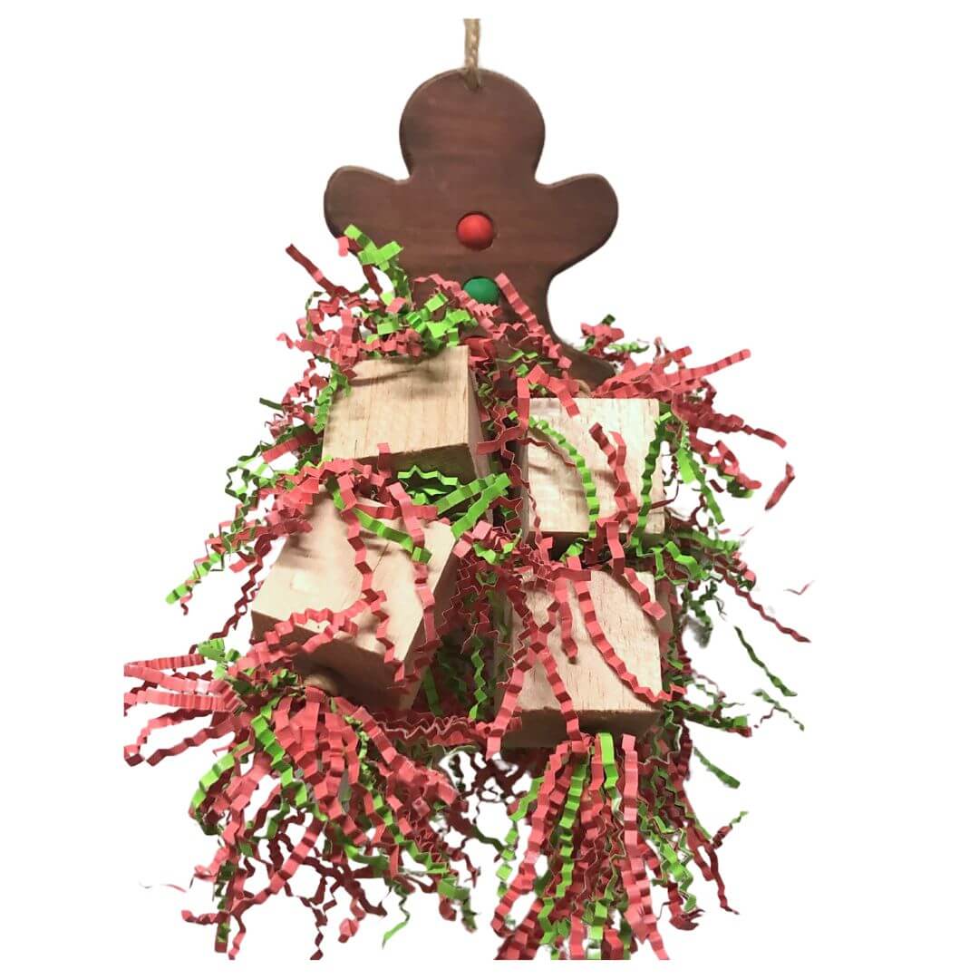 Balsa bird toy with christmas colors and a pinewood gingerbread man as a base.

