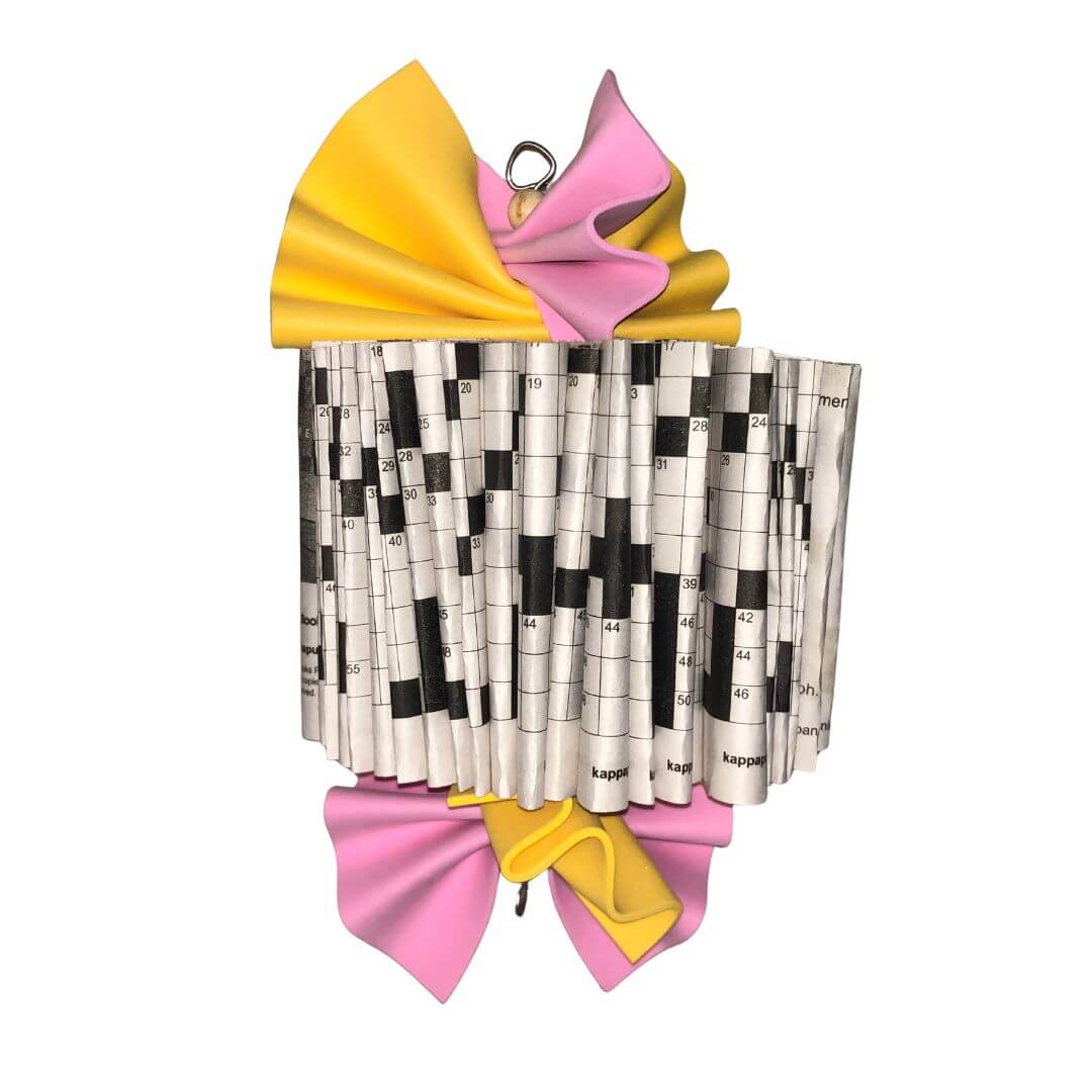 Book folded into a shredder bird toy
