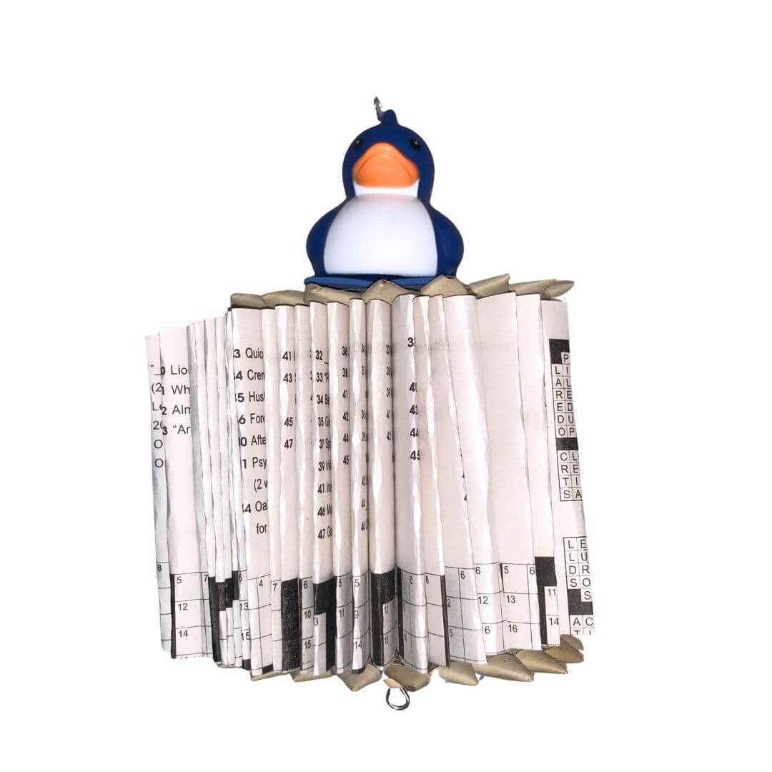 Book folded into a shredder bird toy
