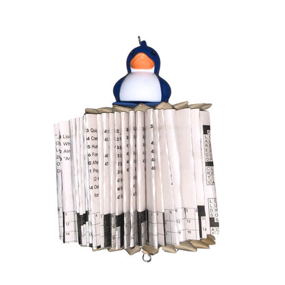 Book folded into a shredder bird toy