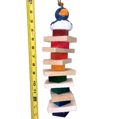 Colorful wooden bird toy with a duck-shaped top, next to a measuring tape for scale.