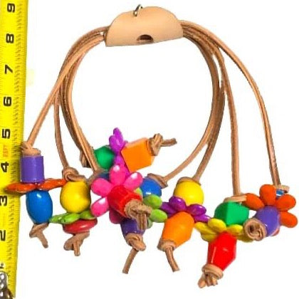leather arch bird toy with beads and charms