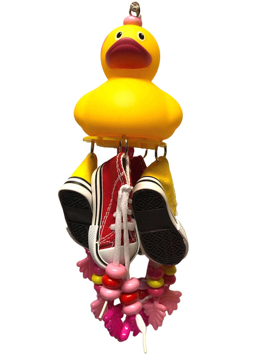 yellow duck with pinks and red shoes and charms bird toy