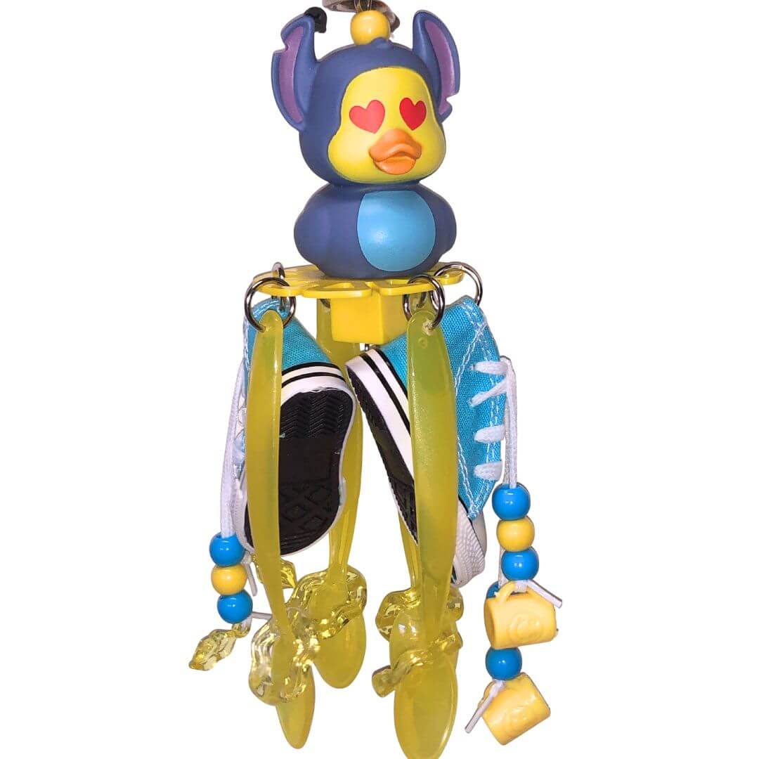 Rubber duck with shoes and spoons bird toy