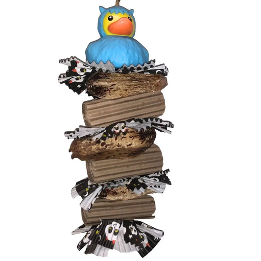 Blue monster bird toy with pods and cardboard
