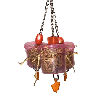 Pink bird toy  with orange accents on a white background