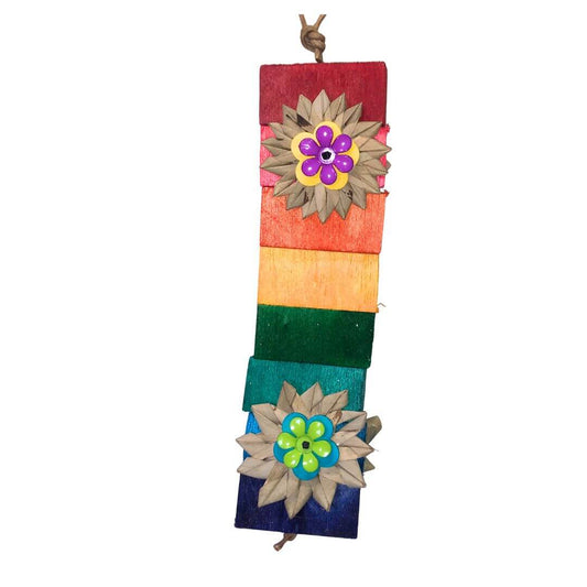 balsa blocks with floral bird toy parts making this a great balsa bird toy for spring
