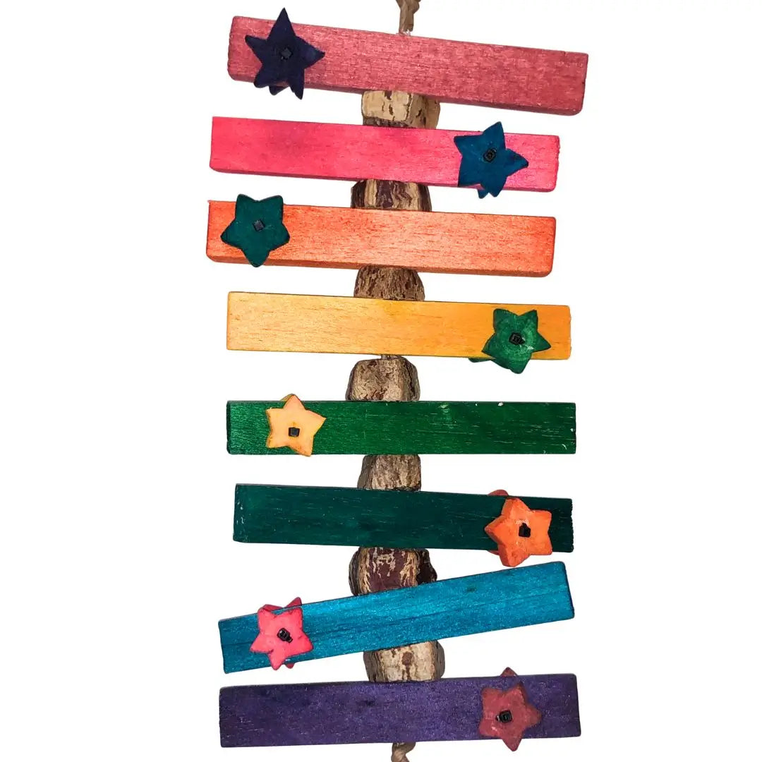 Large balsa bird toy with mahogany pod slices and sola stars. 
