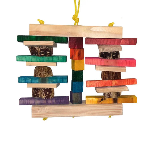 A wooden hanging bird toy with multiple colorful stacked blocks and pod pieces, suspended by a yellow poly rope on a white background.