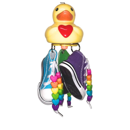 Duck bird toy with three shoes. Rainbow heart shaped beads on shoe string. 