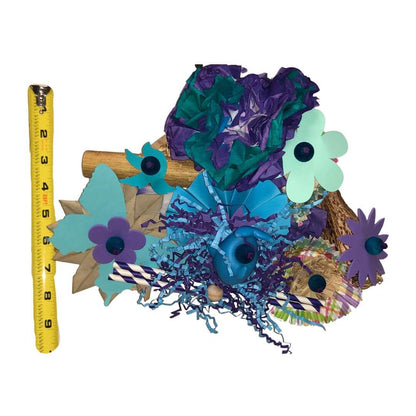 Colorful decorative Bird Toy 
with flowers and a measuring tape on a white background