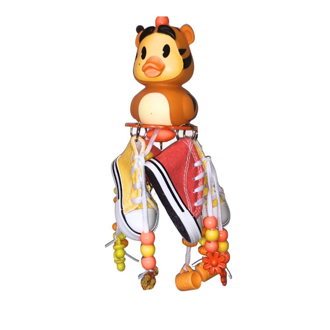 Duck bird toy with yellow and orange shoes 
