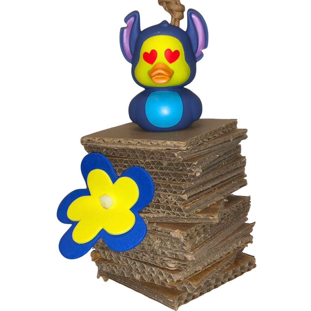 Bird toy with stacks of cardboard
