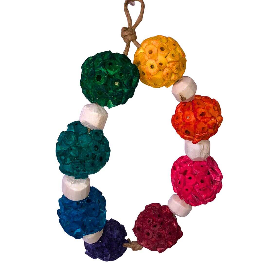 sola bird toy for small birds. rainbow of sola balls with sola beads in an arch.
