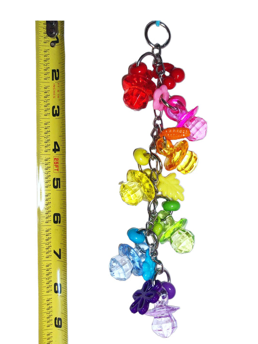 Rainbow Pacifier toy with lots of charms. Indestructible bird toy