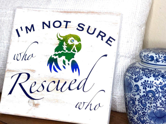 Who rescued Who: Parrot wood sign