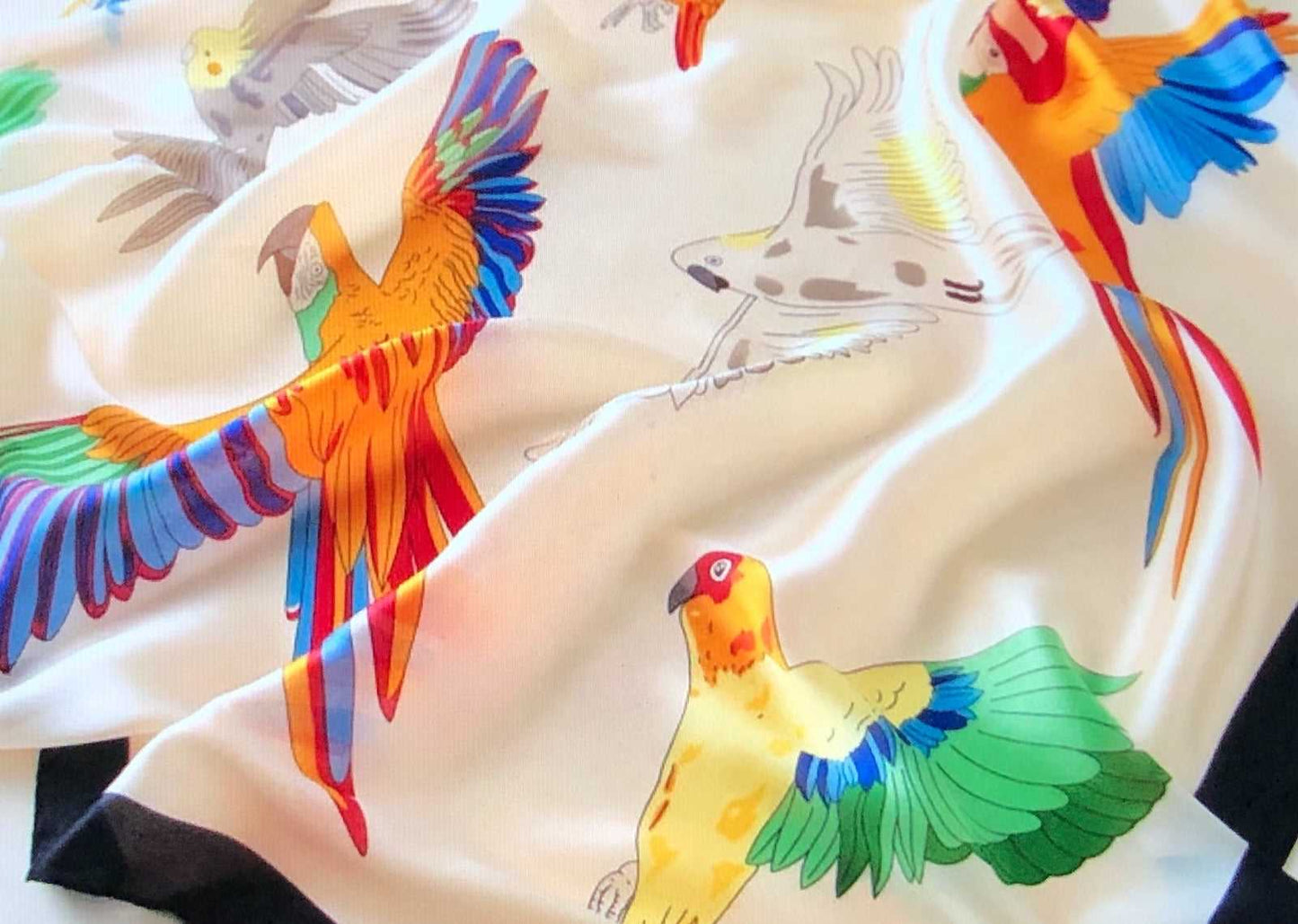 white scarf with parrots 